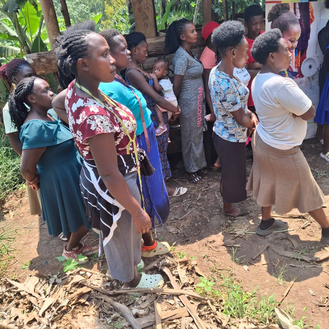 Young women leaders gathered at a community project site, leading advocacy and action